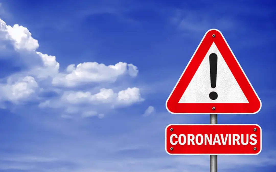 Navigating the new normal | Warning sign for Coronavirus - Benefits Alliance