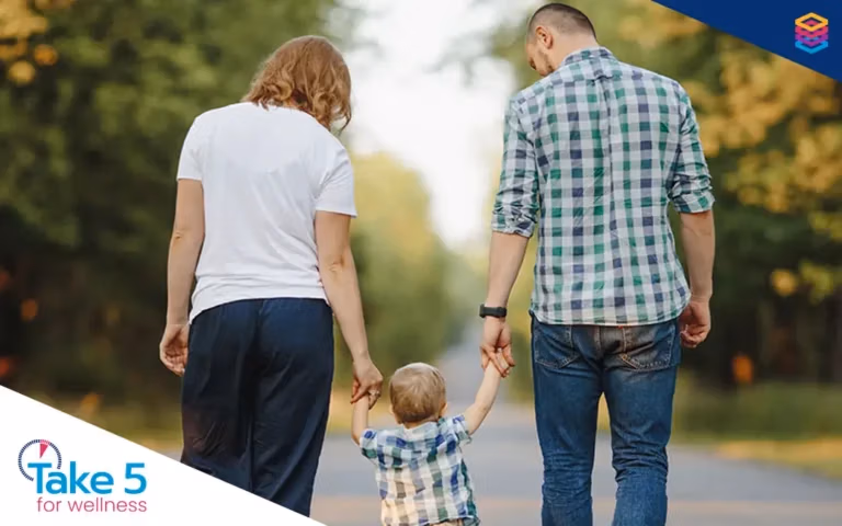 Dont-get-caught-short-during-leaves | Mother and father walking with their toddler - Benefits Alliance