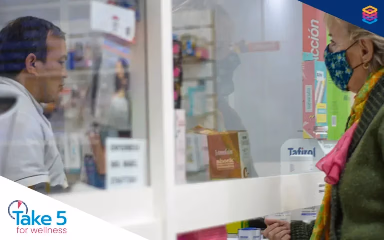 PPNs in the spotlight in Ontario | Older woman talking to a pharmacists - Benefits Alliance