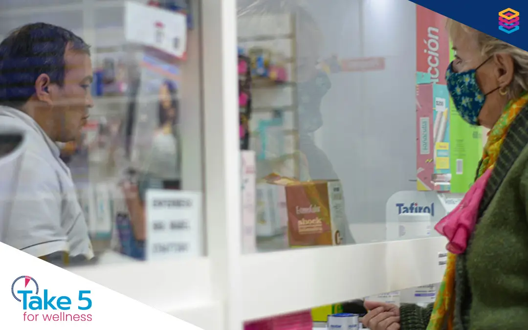 PPNs in the spotlight in Ontario | Older woman talking to a pharmacists - Benefits Alliance