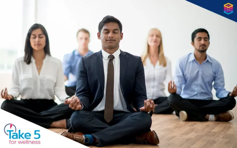 Takin’ care of business (leaders) | Executives doing yoga while suited up - Benefits Alliance