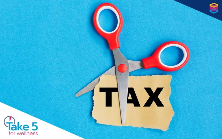 (Tax) credit where it’s due | Pair of scissors cutting a piece of paper with the word tax on it - Benefits Alliance