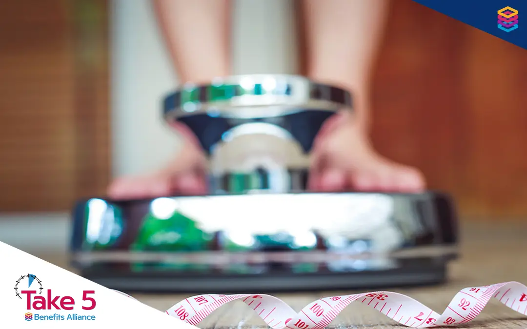 Must-know facts about generics for Wegovy | Two feet on a weight scale in the background with a measuring tape in the foreground - Benefits Alliance